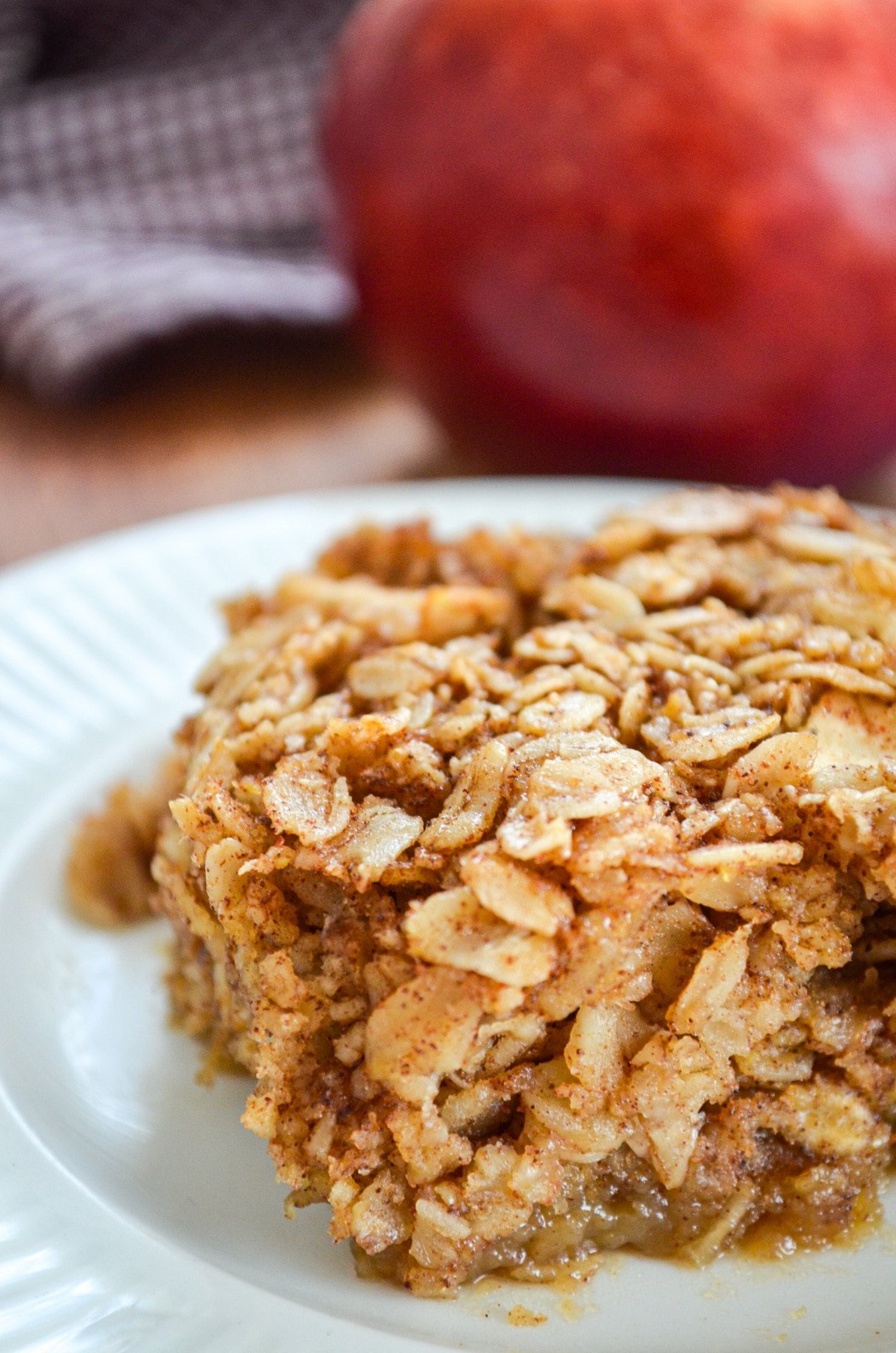 A close up of a piece of apple cinnamon baked oatmeal.