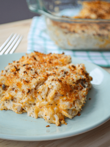 A serving of Poppy Seed Chicken & Rice Casserole on a plate.