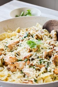 Creamy Lemon Chicken Bowties is THE BEST chicken and pasta recipe! You will want to serve this to company and is sure to become a new favorite in your home!