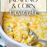 A spoon taking a portion of creamy jalapeño casserole with corn.