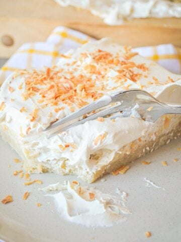 The delicious, creamy taste of Coconut Creme Pie, with the sweet, dense, buttery texture of shortbread. Coconut Cream Shortbread Bars are a MUST TRY recipe!