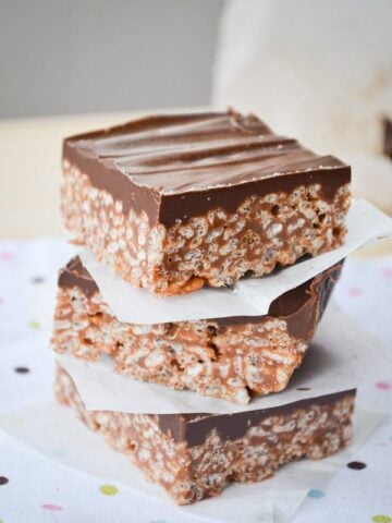 Mars Bar Squares are the ultimate easy dessert! Melted chocolate bars combine with rice cereal (AKA Rice Krispies) to make something wonderful!