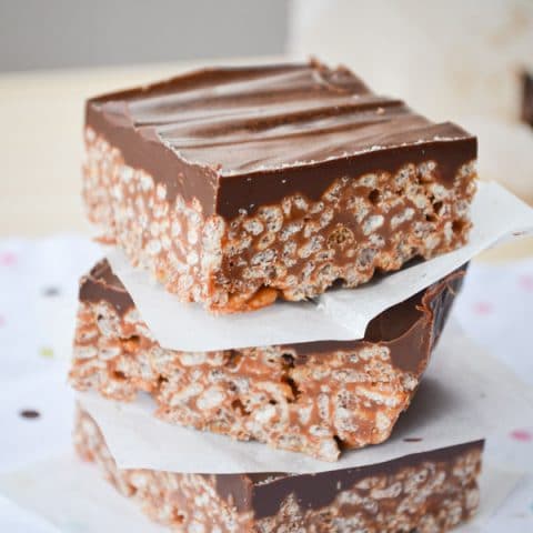 Mars Bar Squares are the ultimate easy dessert! Melted chocolate bars combine with rice cereal (AKA Rice Krispies) to make something wonderful!