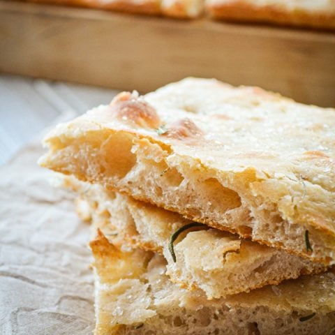Fun, bubbly, and crisp, Pizza Bianca can serve as a side dish, bread option, or even main course. It all depends on how you choose to top it! This recipe is made with sourdough and is fully fermented overnight for a complex flavor and ease of preparation.