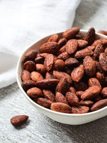 These delicious roasted almonds are the perfect snack! Sugar free, and roasted with butter, Himalayan pink salt, and the perfect combination of seasonings, these simple smoky roasted almonds are full of protein and healthy fats. A little bit of liquid smoke is added for that signature flavor. Great for keeping on hand for when the snackies hit!