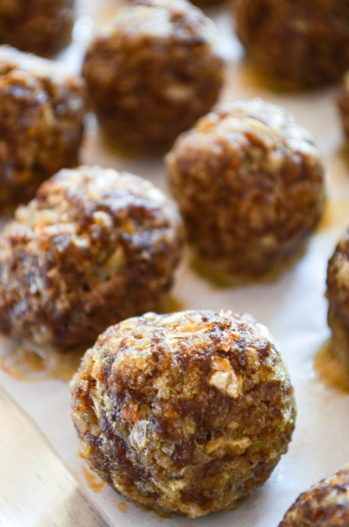 A tray of cooked meatballs.