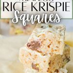 A stack of rice krispie squares, with a text overlay that says: mini egg rice krispie squares.