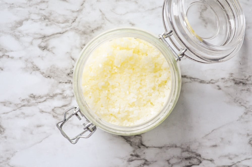 An overhead view of Facial Salt Scrub made with all natural ingredients and sweet orange essential oil.