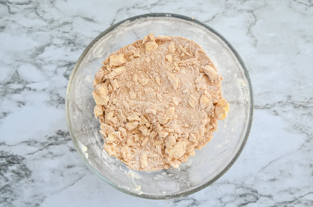 A bowl of cinnamon streusel topping.