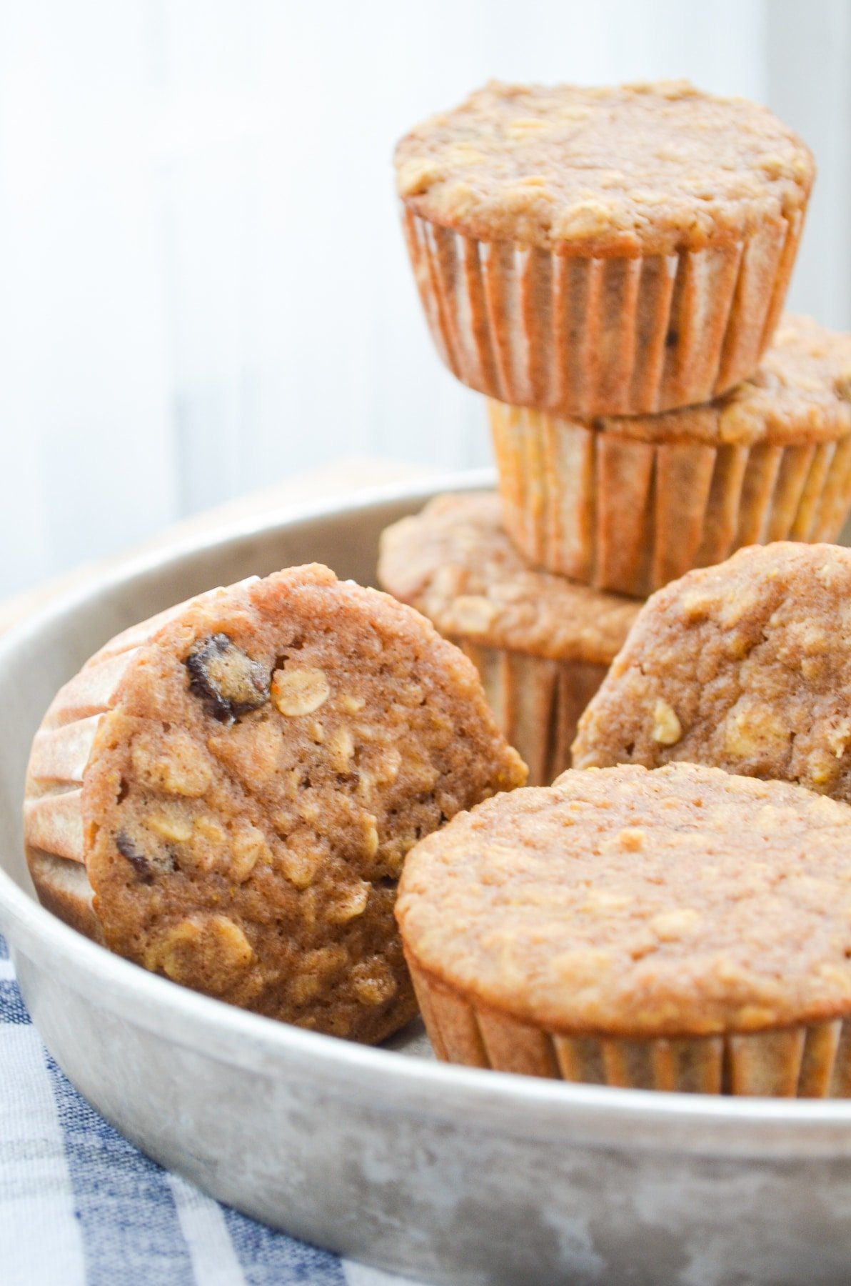A pan of muffins, stacked high.