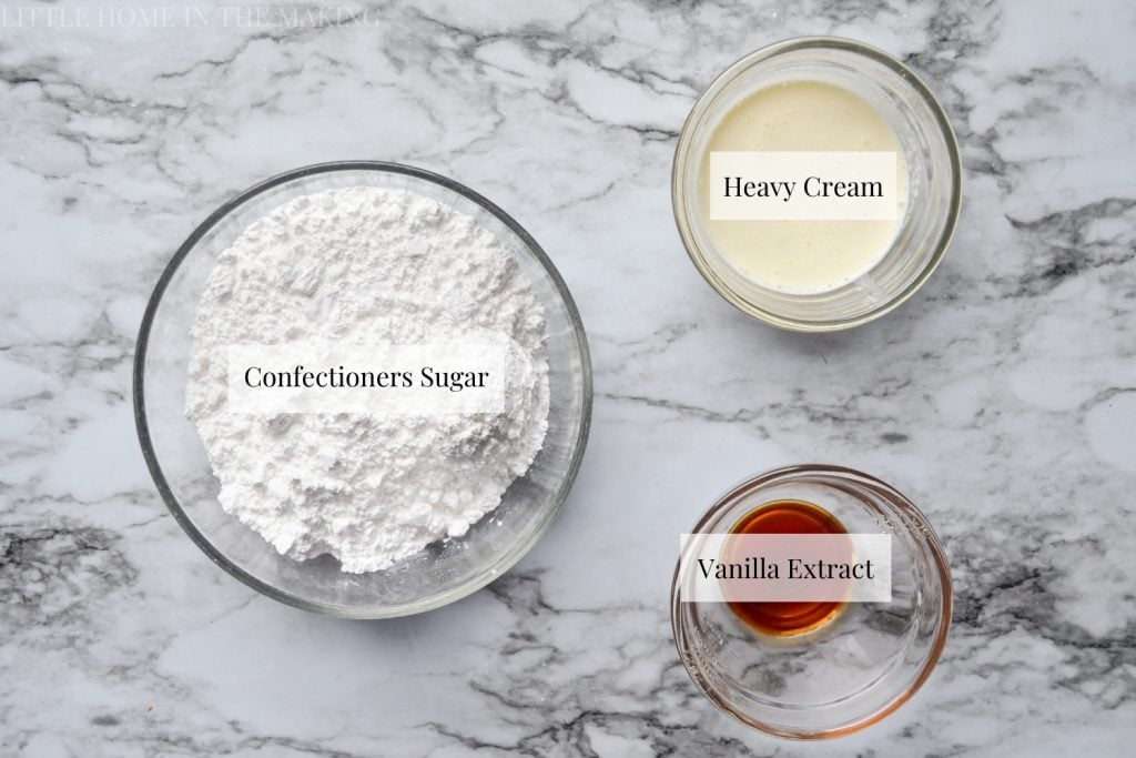 Ingredients needed to make a simple drizzle: confectioners sugar, heavy cream, and vanilla extract.