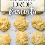 A sheet pan filled with sourdough biscuits.