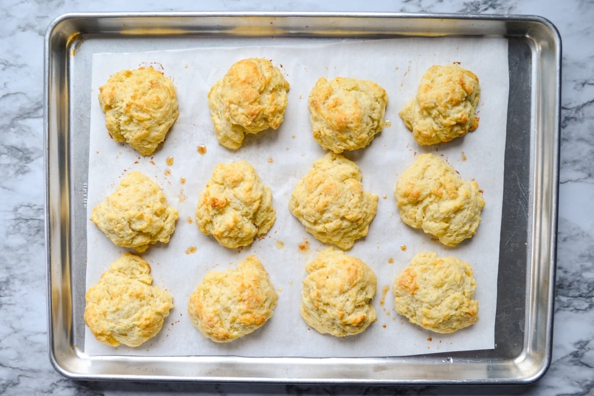 A baking sheet of sourdough discard drop biscuits.