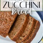 Slices of zucchini bread on an oval plate.