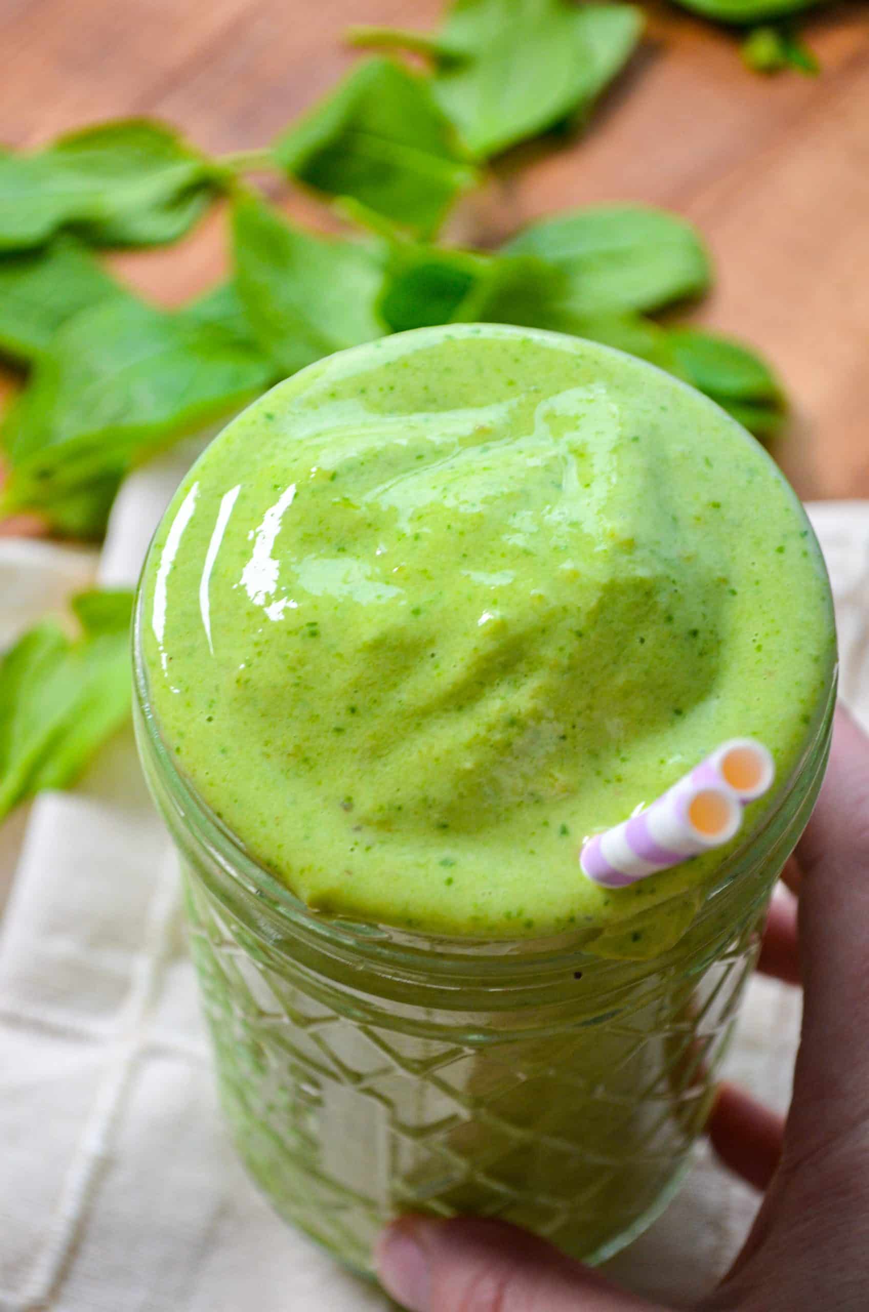 A large glass tumbler or jar filled with a homemade smoothie.