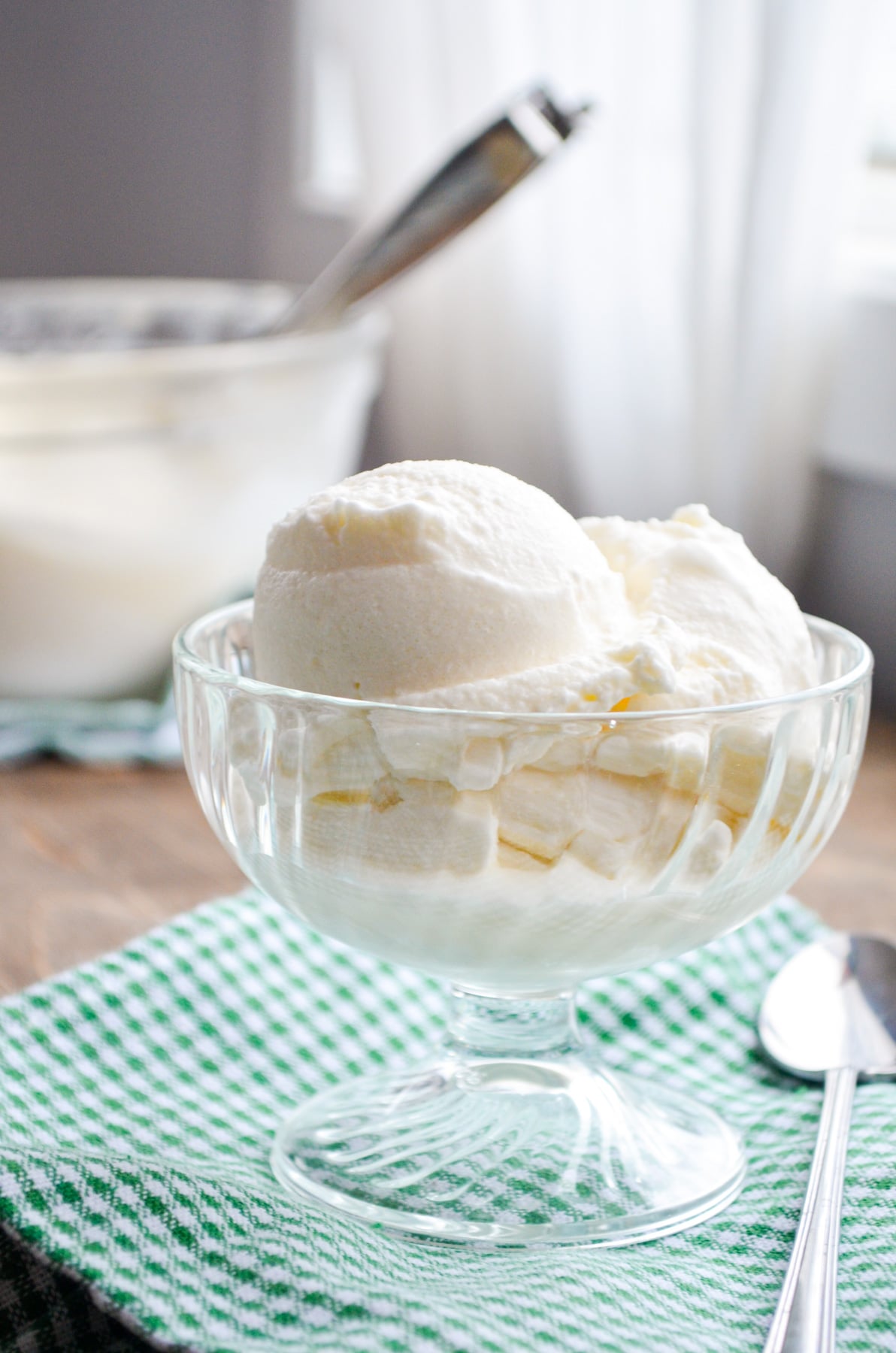 A dish of snow ice cream, resting on a green napkin.