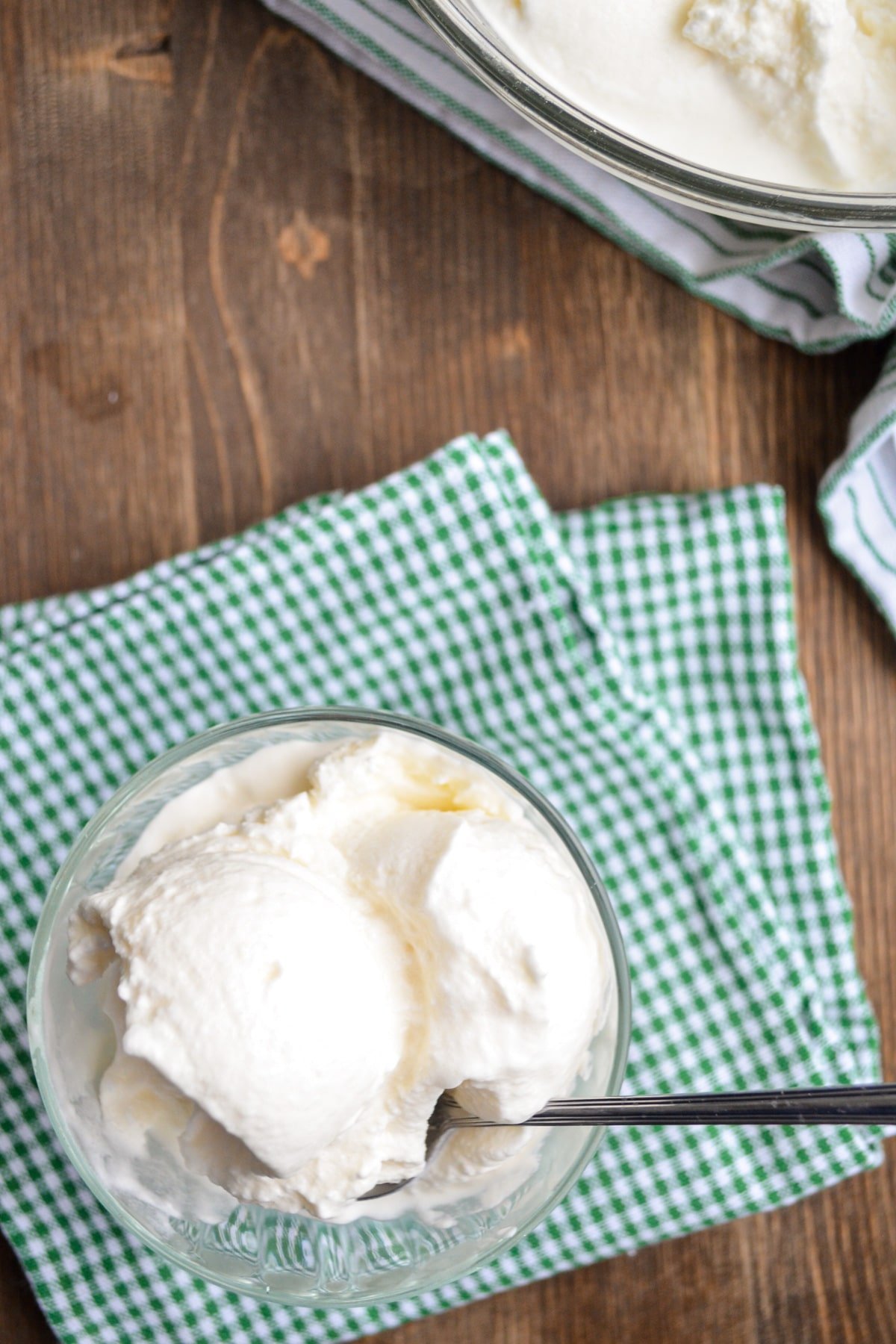 A dish of snow ice cream resting on a napkin.