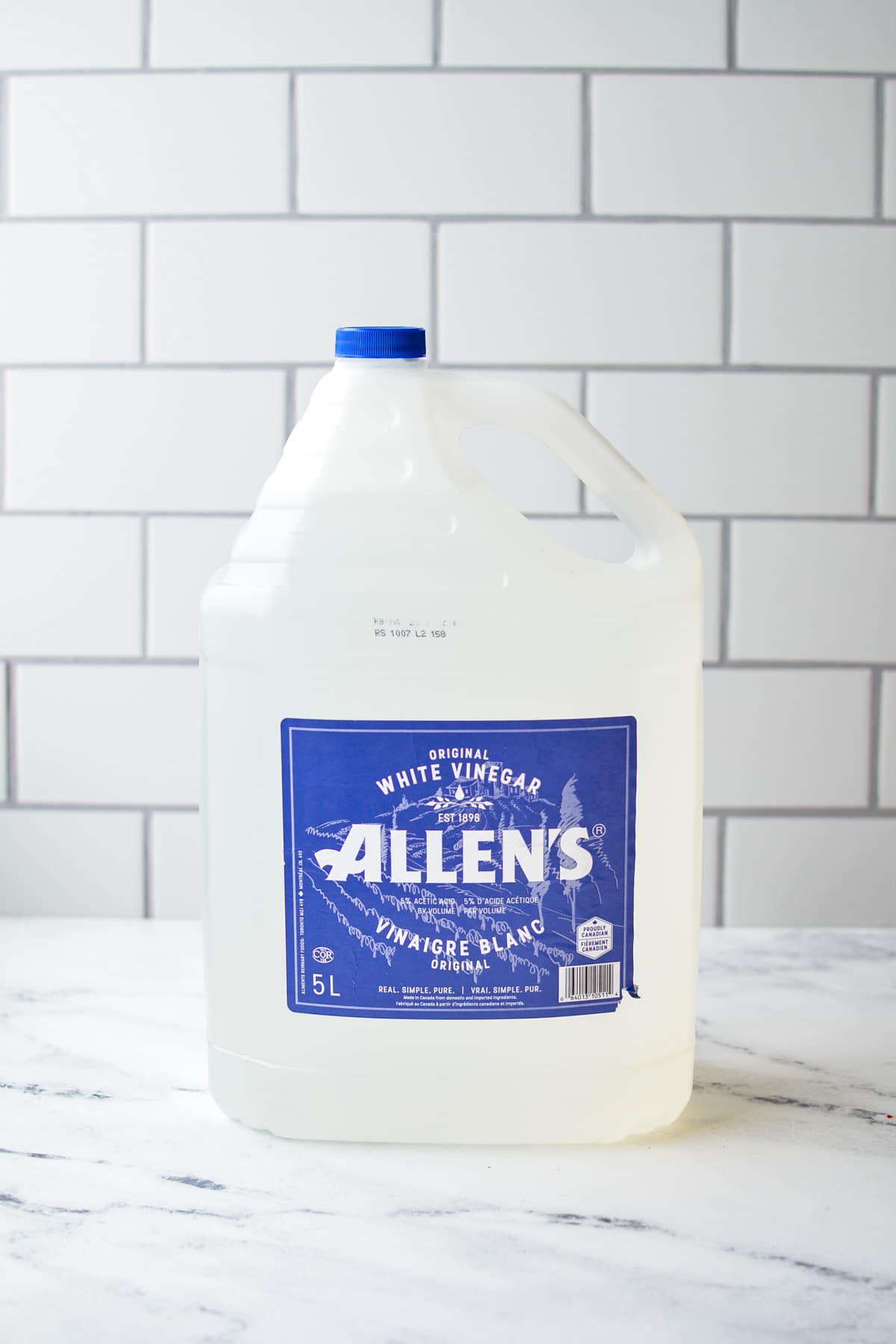 A gallon jug of vinegar