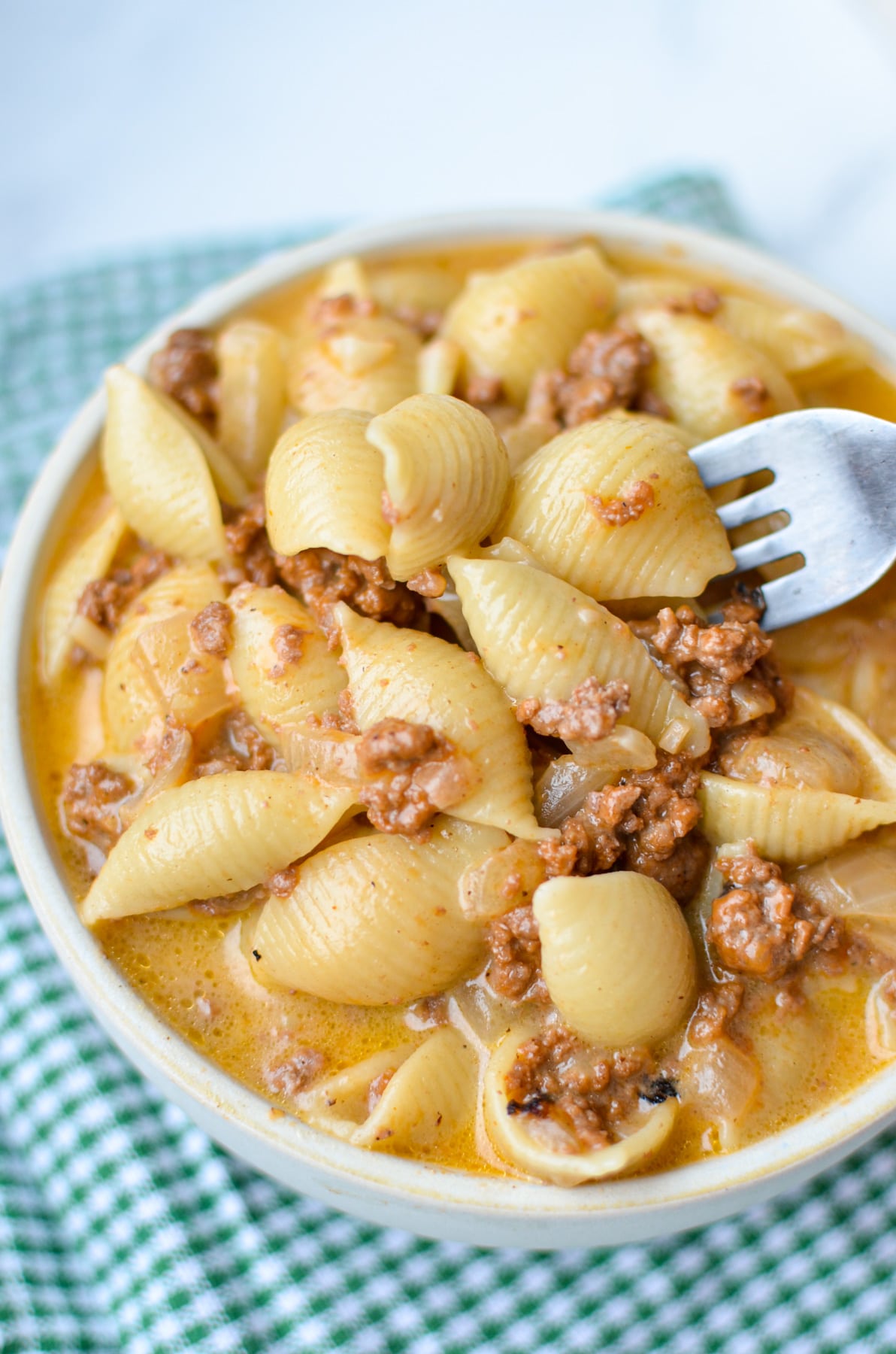 A bowl of homemade hamburger helper with beef and pasta.