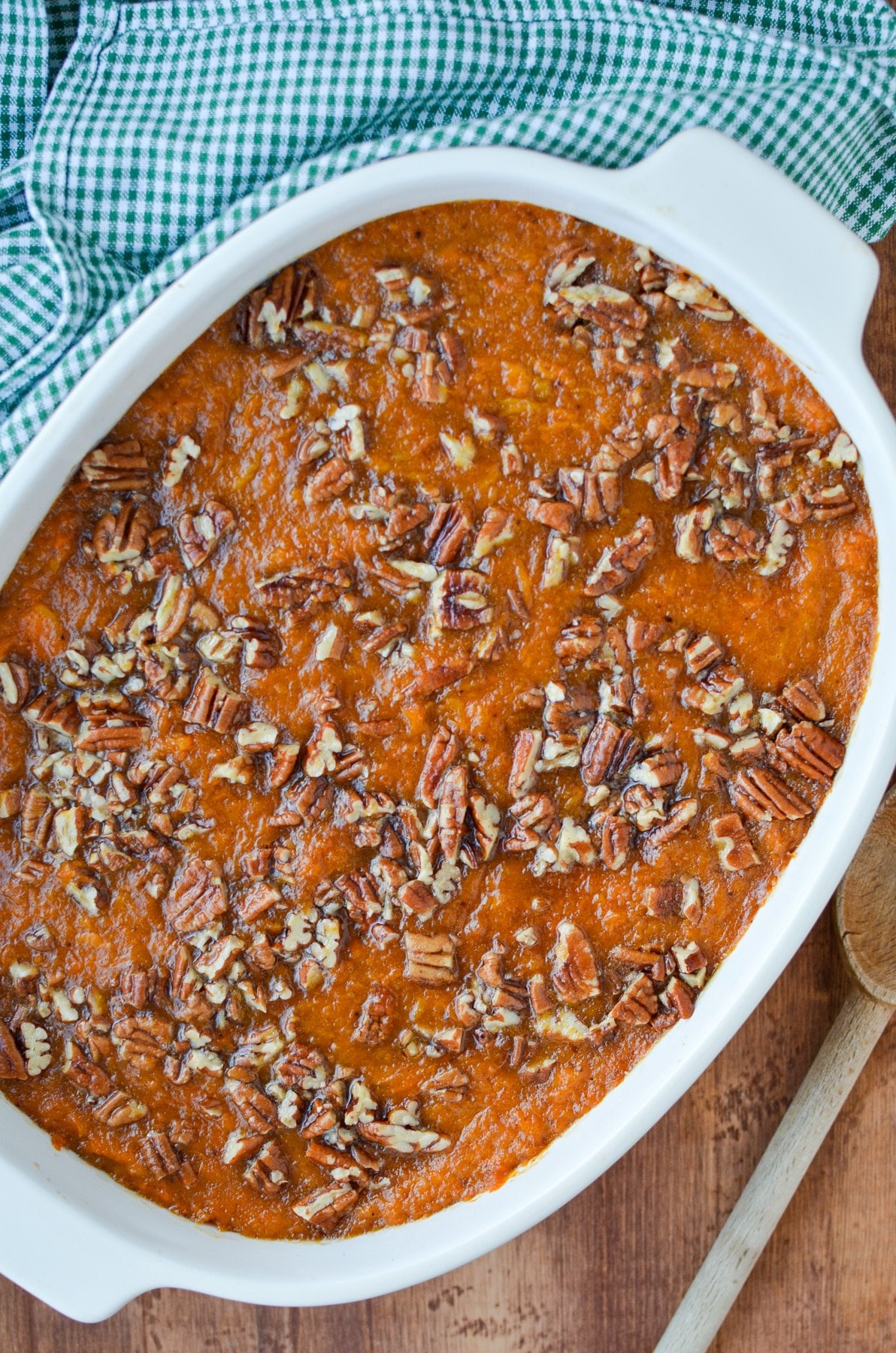 A baked healthy sweet potato casserole with a praline topping