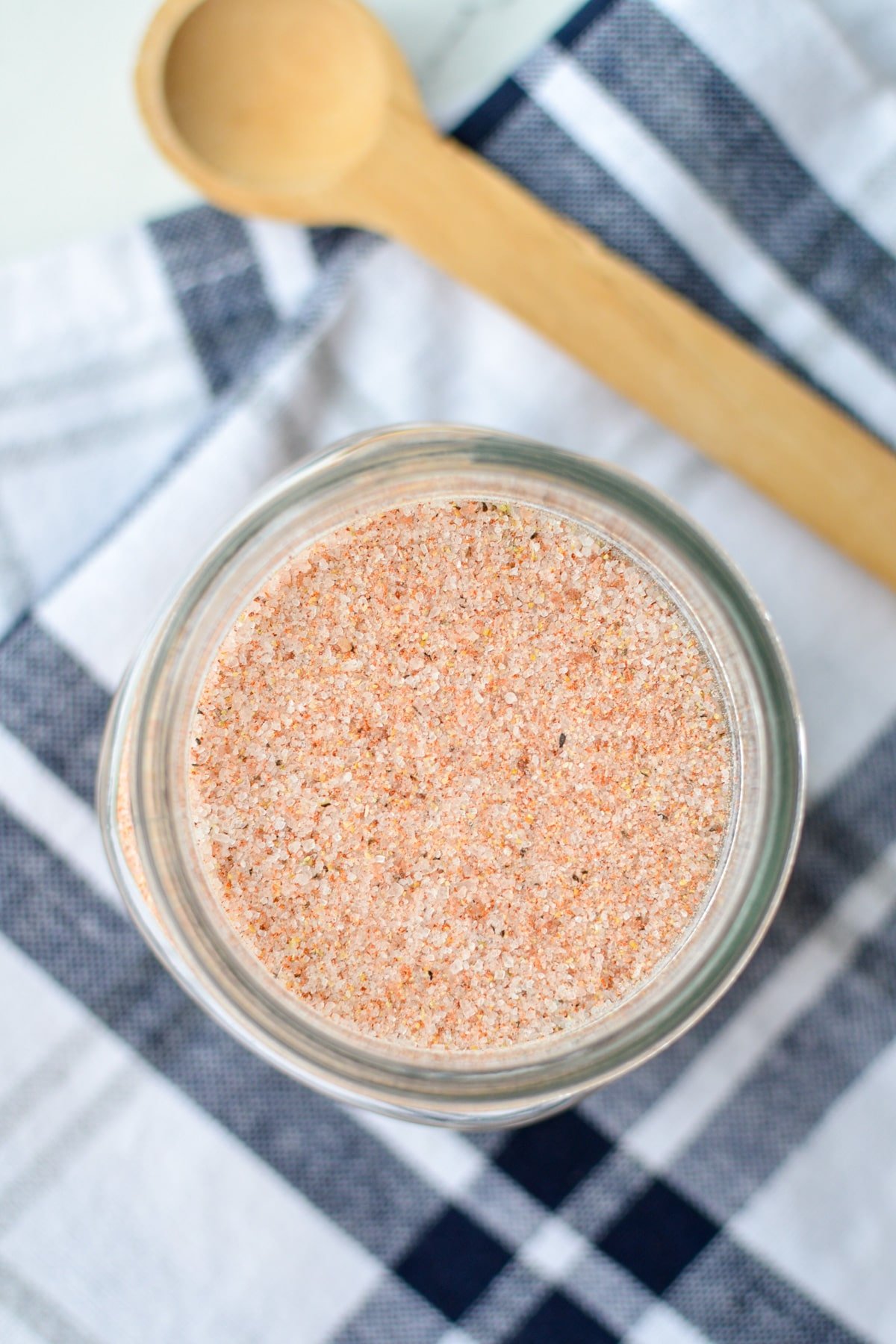 An overhead view of a jar of seasoned salt.