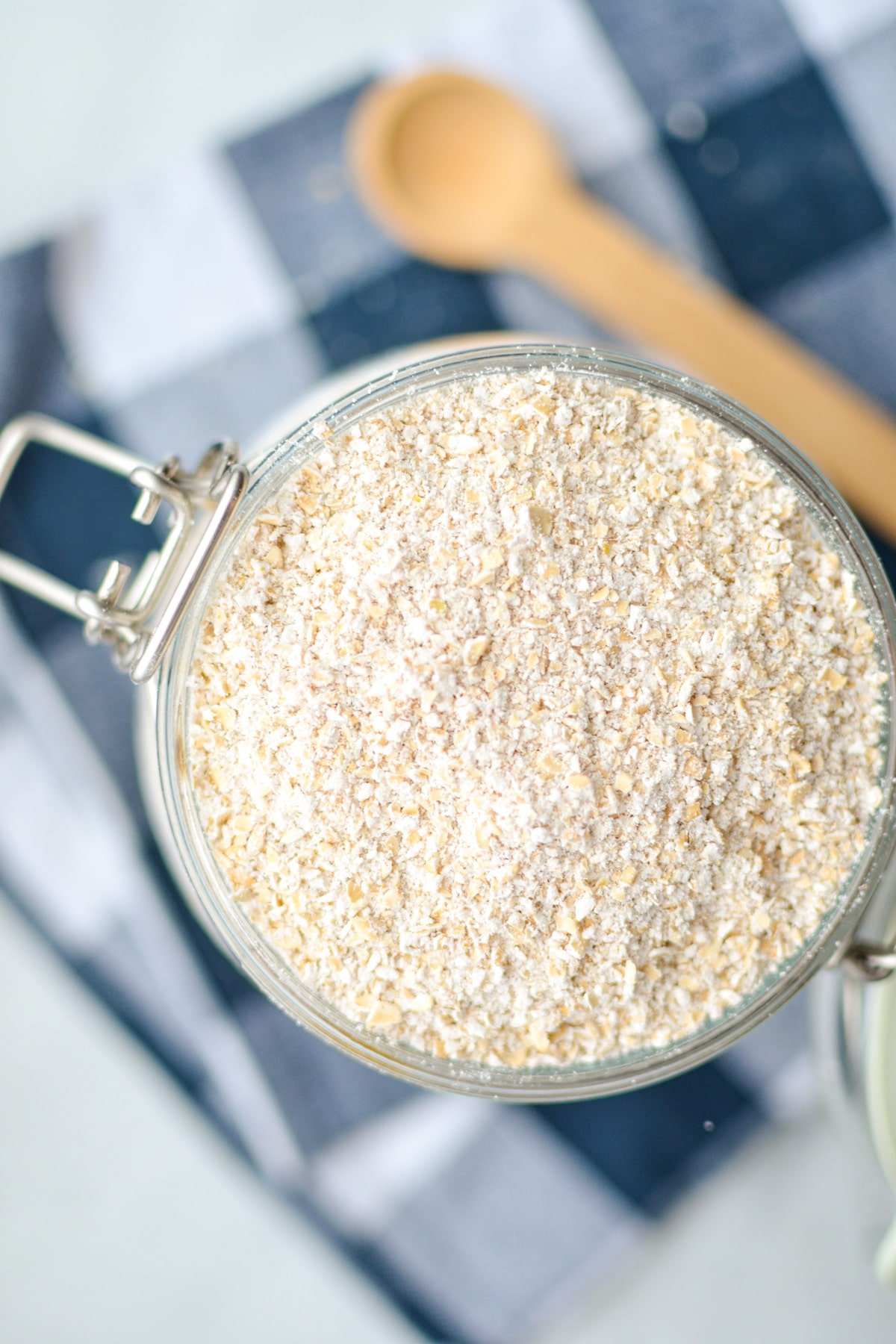 An overhead shot of a jar of sprouted oat flour.