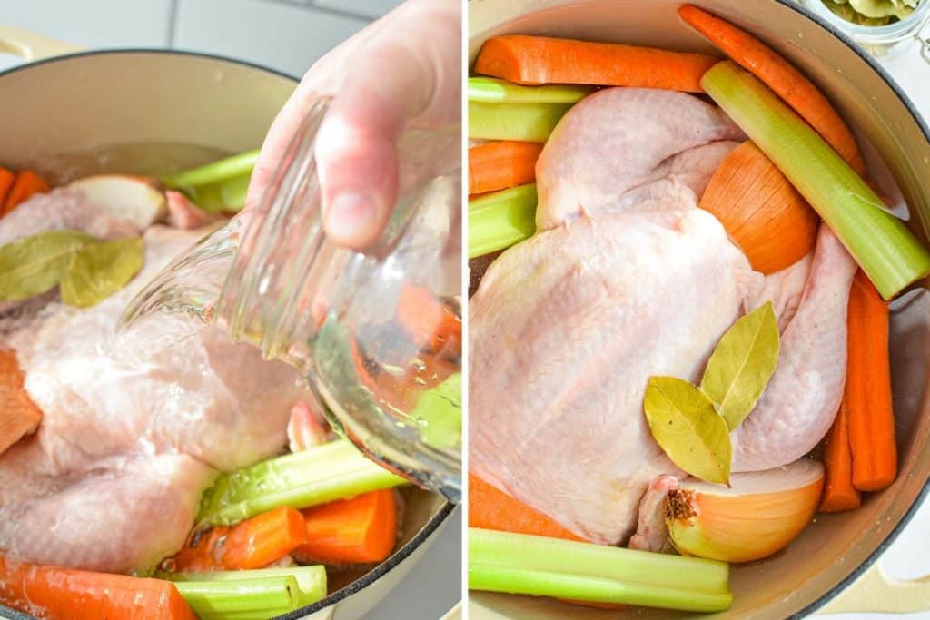 Adding water to a dutch oven with a whole chicken and cut veggies to make broth.