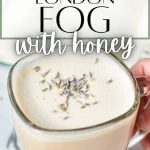 A hand reaching for a mug full of a creamy latte. The text overlay reads: London Fog with Honey.