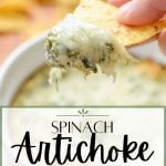 A chip dipping into hot spinach artichoke dip topped with cheese.