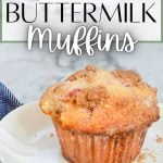 A single muffin on a plate. The text overlay reads: strawberry buttermilk muffins.