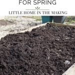 A large garden bed filled with compost.