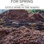 Piles of mulch in a raised bed.