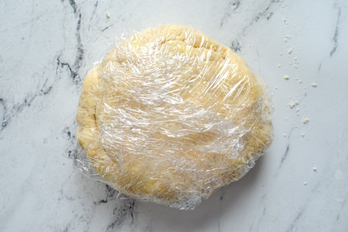 A wrapped piece of sourdough, ready to be chilled.