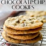 A stack of cookies on a wire rack. The text overlay reads: sourdough chocolate chip cookies.