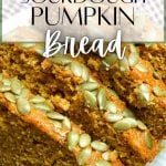 A close up of slices of pumpkin bread topped with pumpkin seeds.