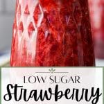 A close up of a jar of strawberry jam.