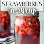 Jars of strawberries, having been canned for preservation.