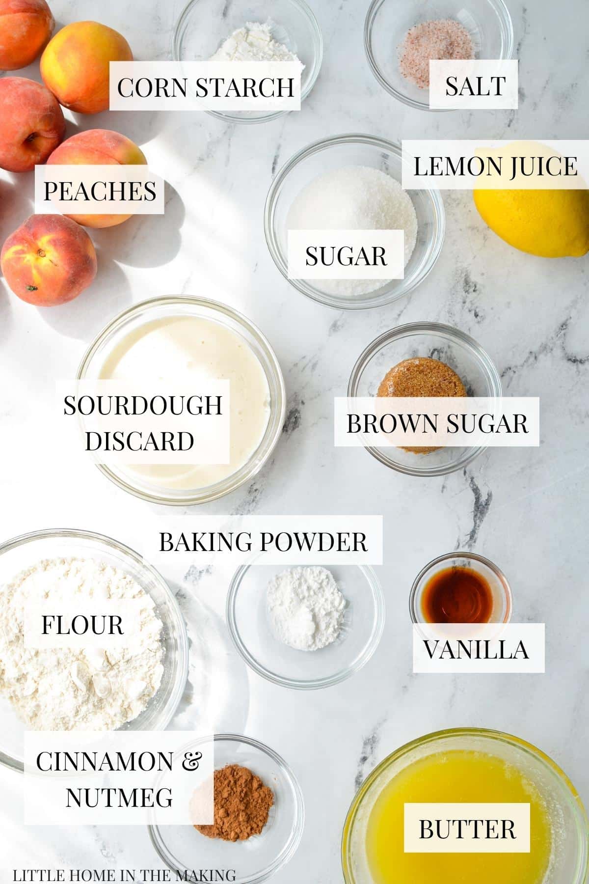 The ingredients needed to make peach cobbler with sourdough, including fresh peaches, butter, and flour.