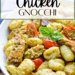A bowl of gnocchi with pesto, cherry tomatoes, and sliced chicken.