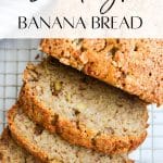 Slices of banana bread on a wire rack.