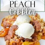A shallow bowl of peach cobbler, topped with ice cream.