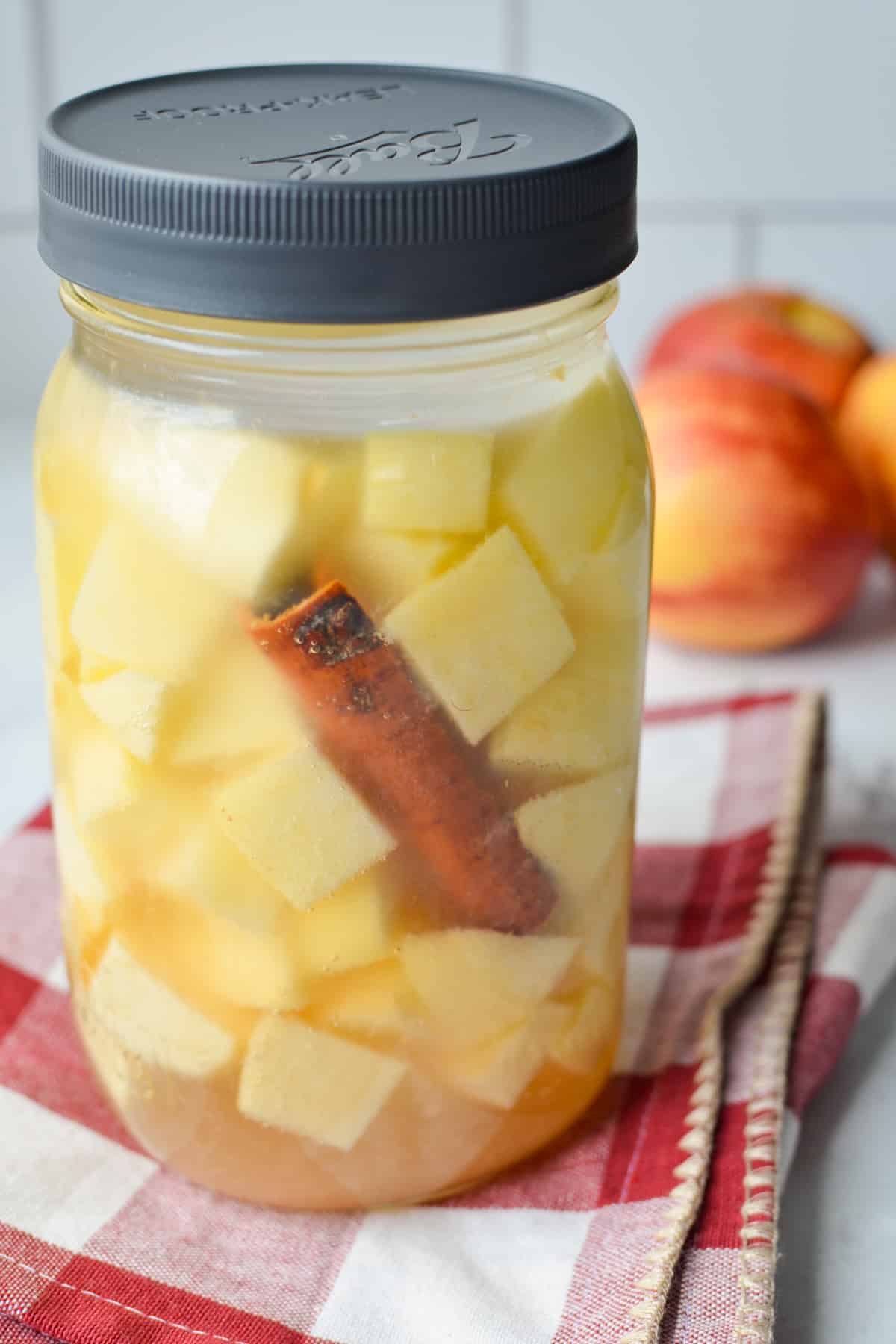 A jar of lacto fermented apples.