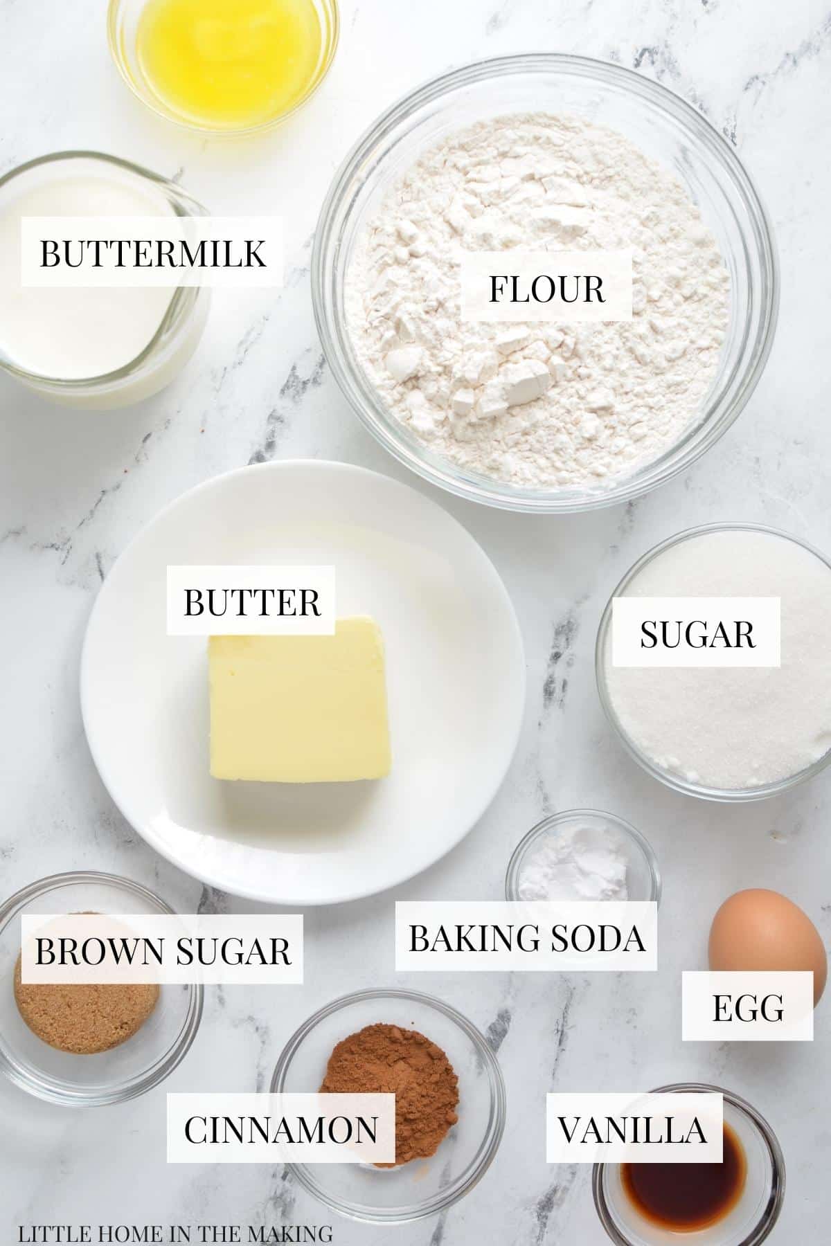 The ingredients needed to make Amish cinnamon bread, including butter, flour, and buttermilk.