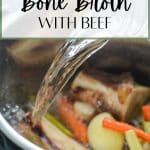 Adding water to an Instant Pot with beef bones and veggies.