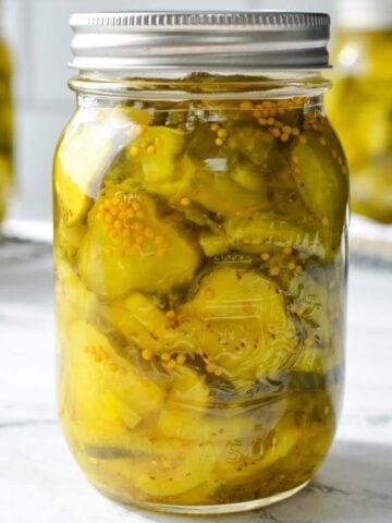 A jar of bread and butter pickles.