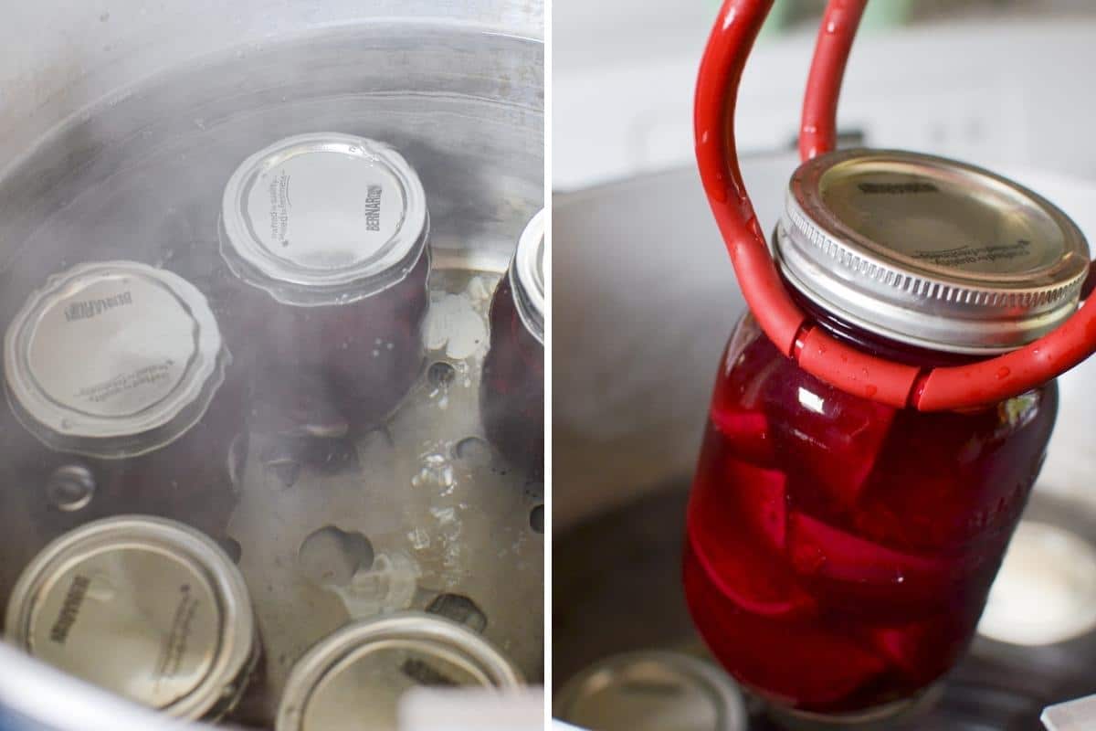 Lowering jars of pickled beets into a canner.