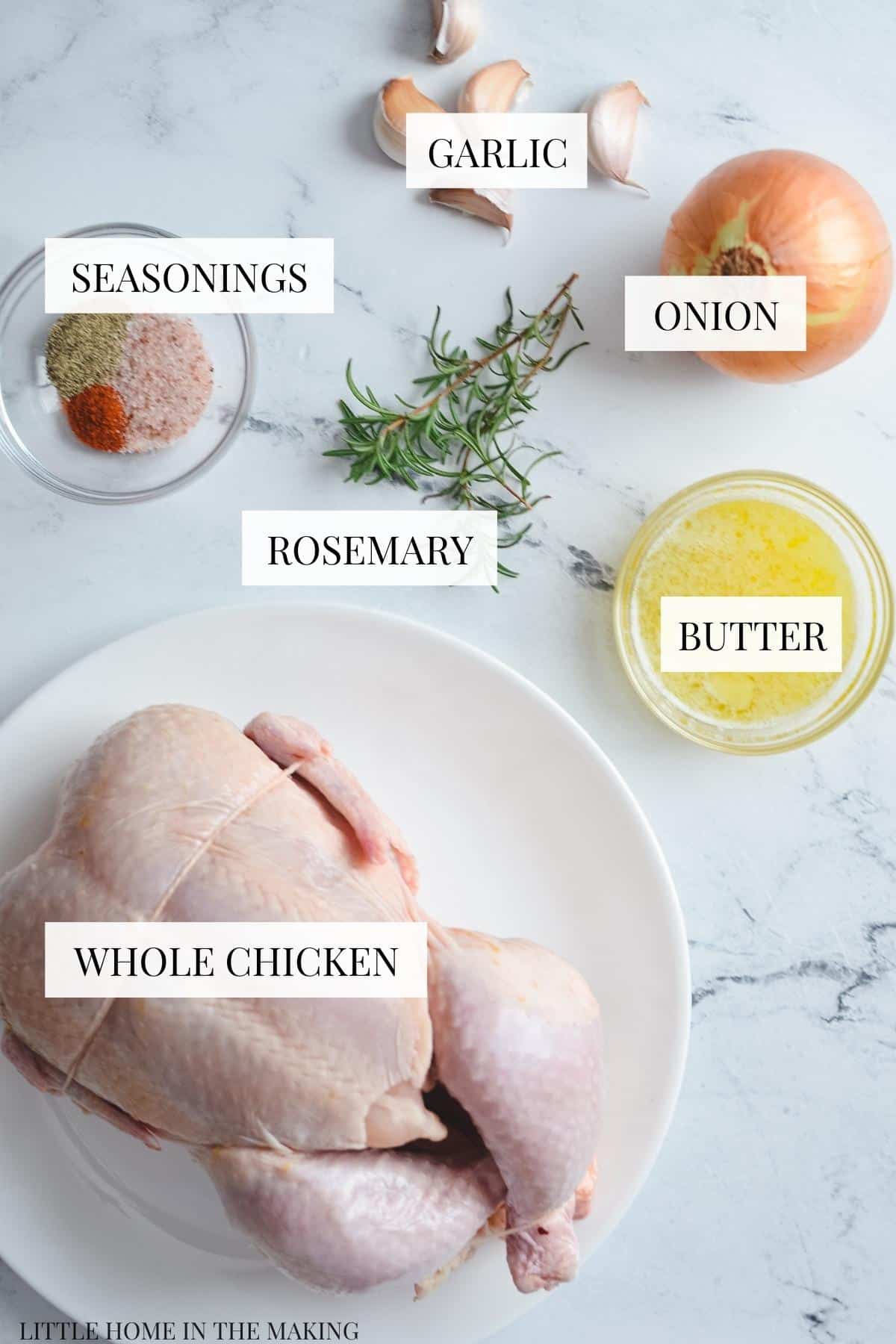 The ingredients needed to make a whole chicken in a Dutch Oven: chicken, onion, rosemary, melted butter, garlic, and seasonings.