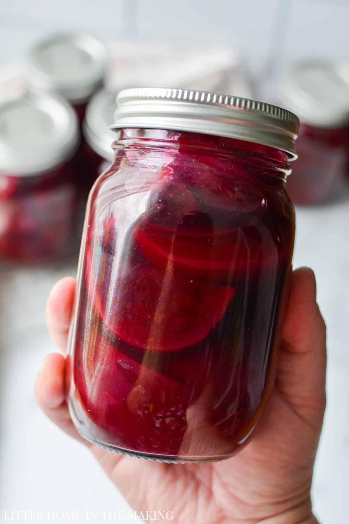 A jar of pickled beets.