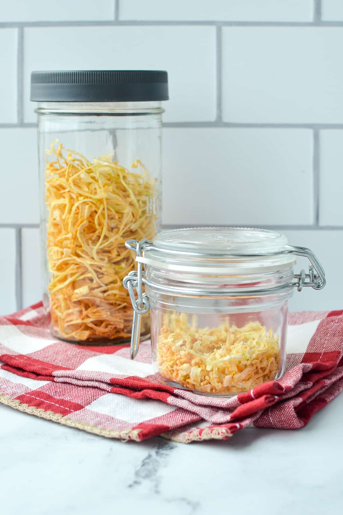 Jars of dried onion pieces.