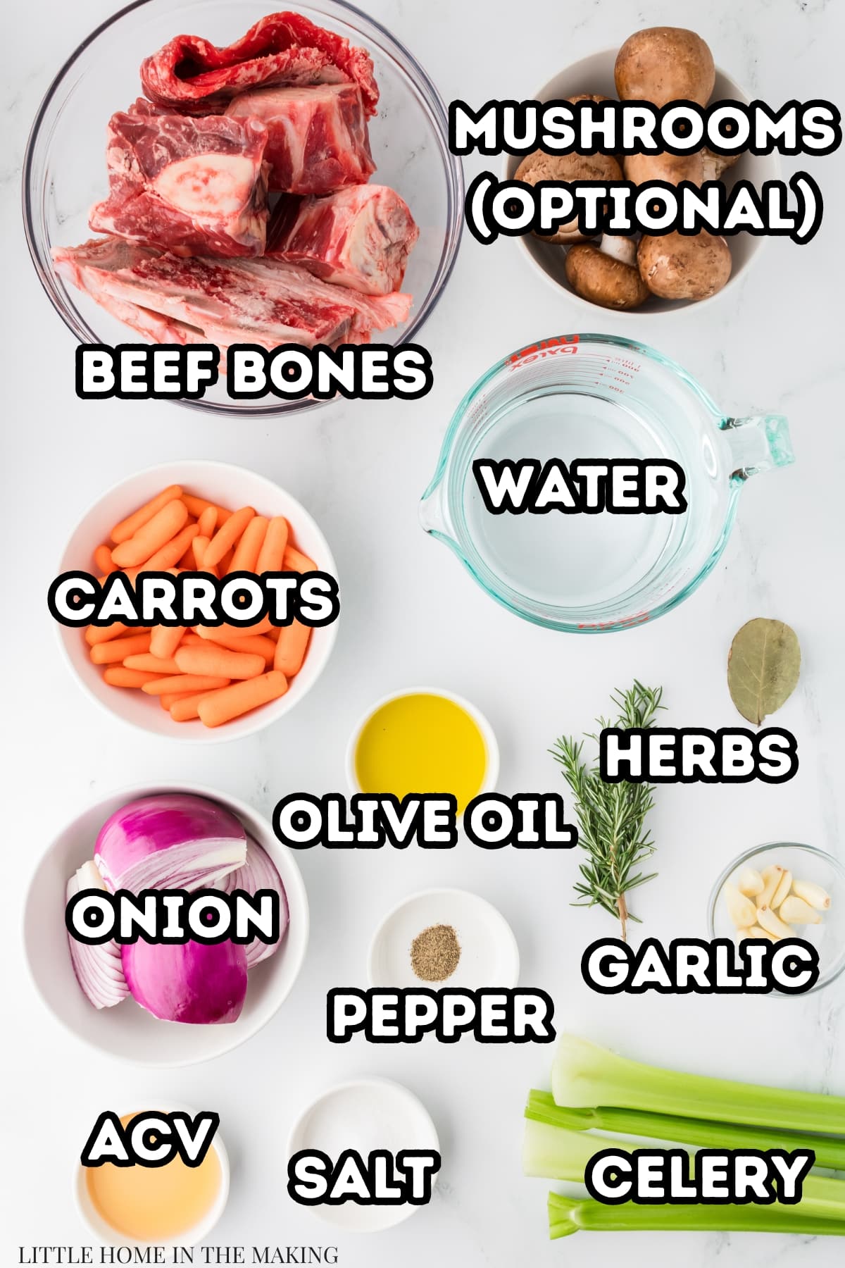 The ingredients needed to make broth: beef bones, mushrooms, carrots, onion, olive oil, herbs, and a few other ingredients.